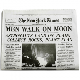 A Picture Of An Old Newspaper With The Moon Landing On The Cover