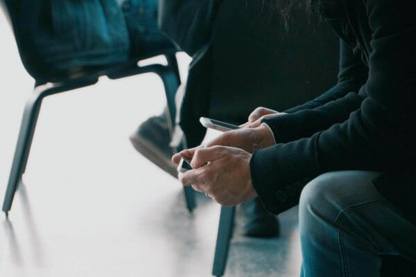 a screenshot of a person using a mobile phone.