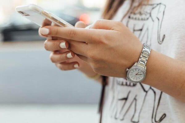 an image of a woman using a mobile phone.