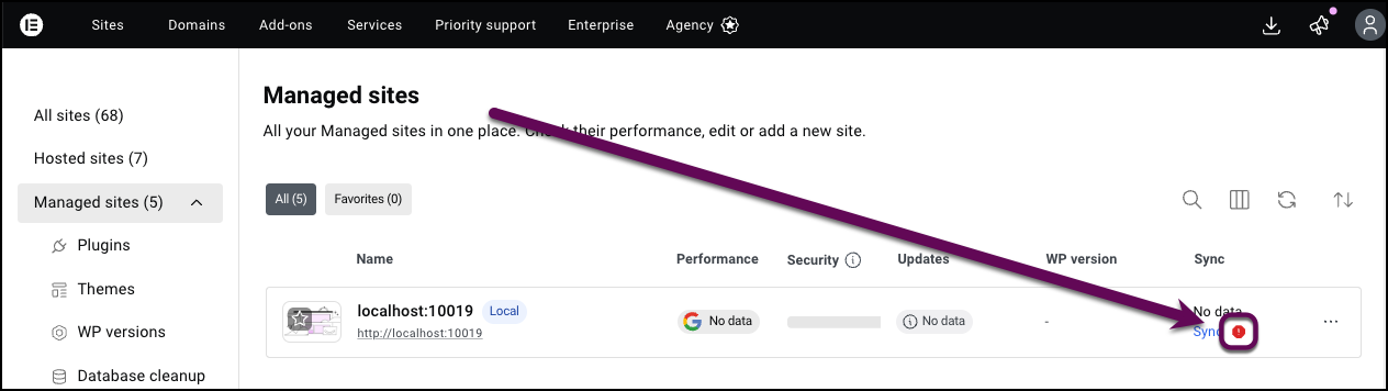 The error icon showing a sync error with Manage